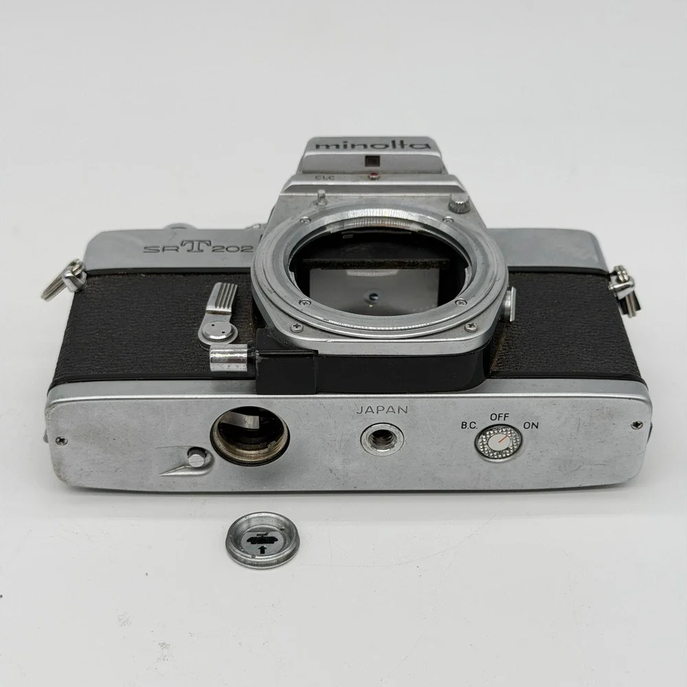 Minolta SRT 202 35mm SLR Film Camera Body Silver Black Vintage 2396308